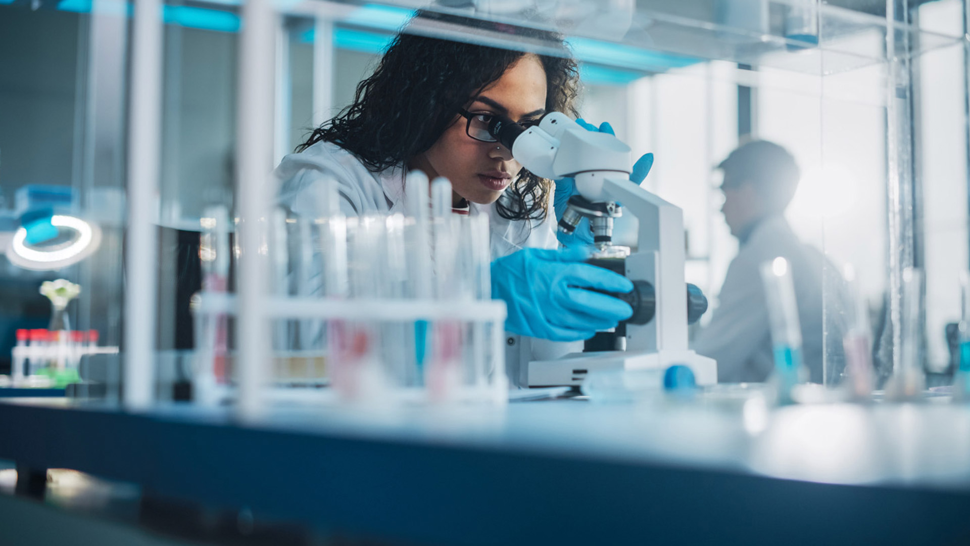 person in lab doing tests
