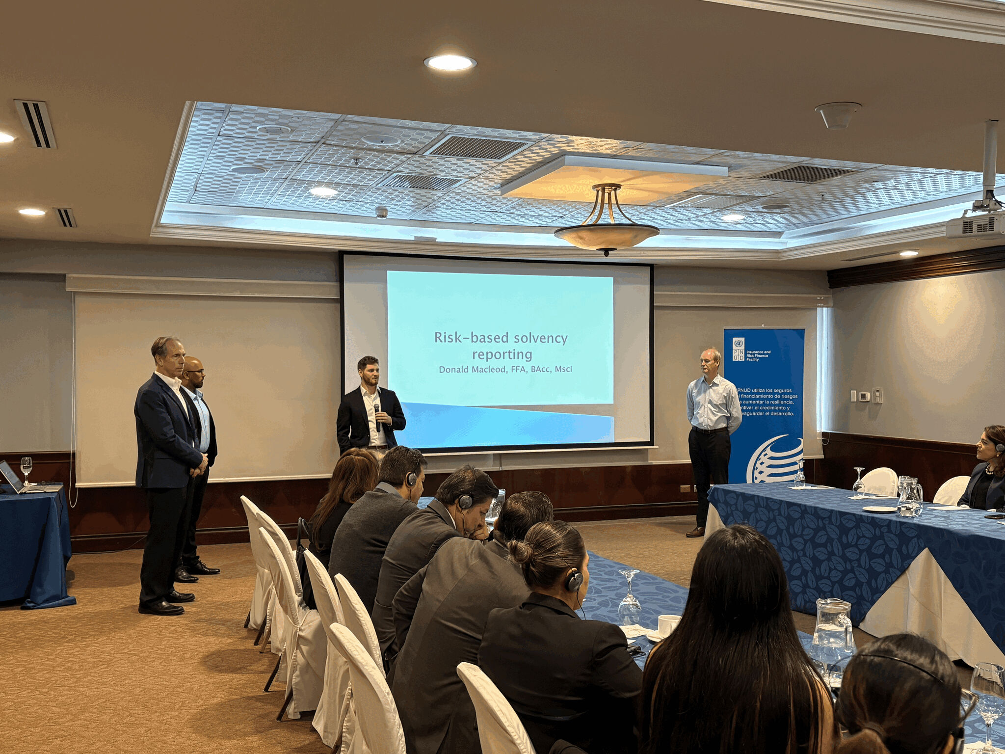 Colin joins discussions on how to strengthen actuarial capacity in Ecuador.