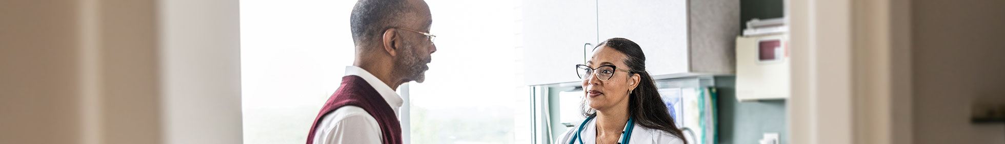A patient talking with their doctor.
